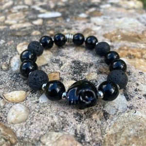 Triple black skull bracelet